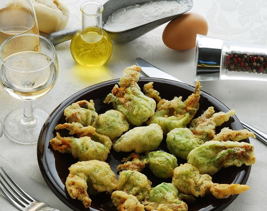 Stay at the Cantemerle in Vence, taste the local specialities: Zucchini flower fritters